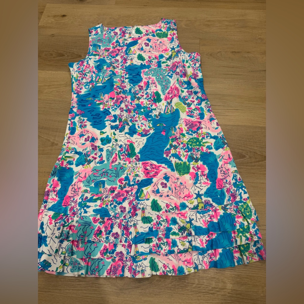 Colorful Sleeveless Dress with Ruffle Bottom.